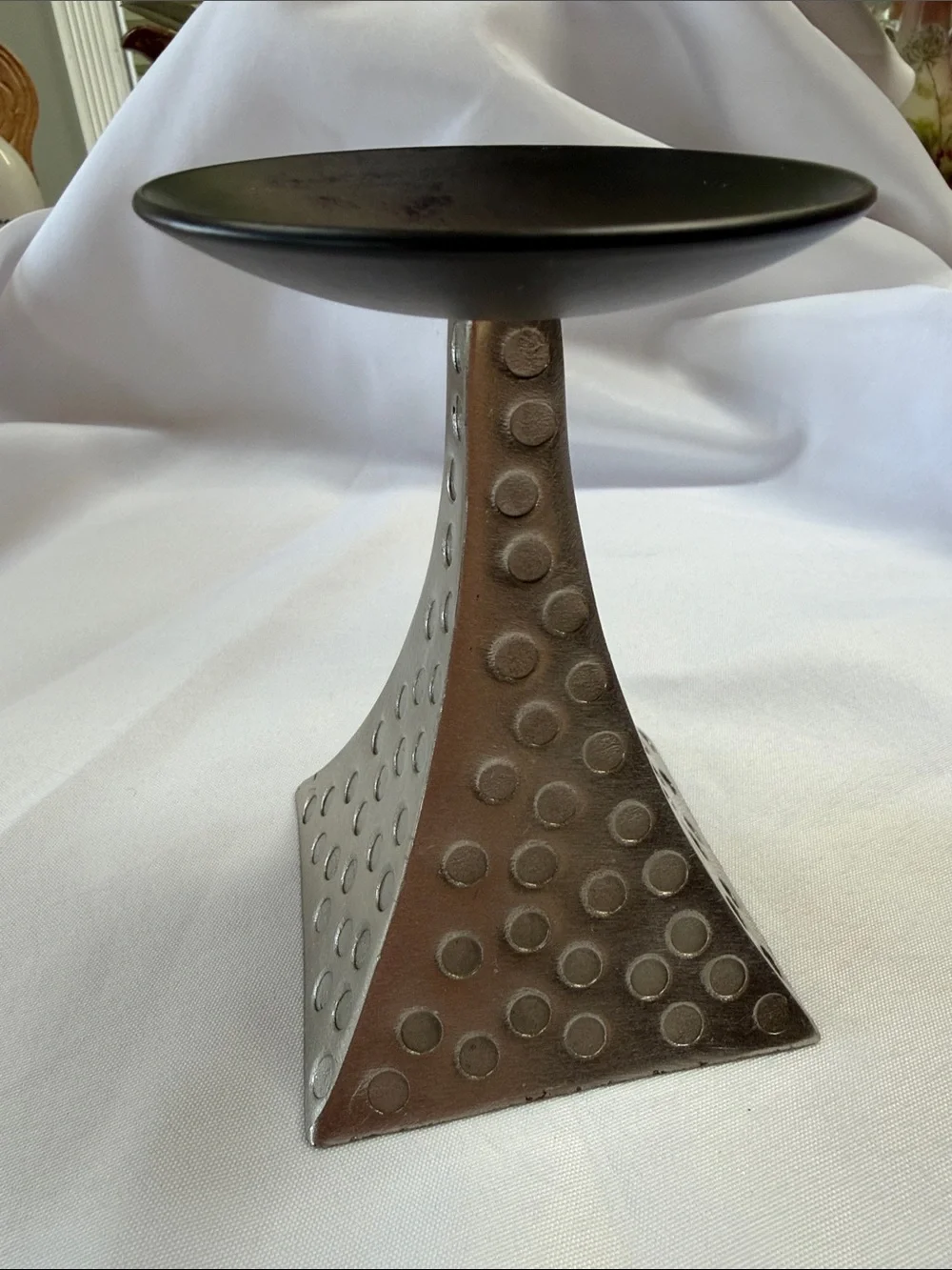 Pier 1 vintage silver and black candlestick. Good condition. Approximately 5”.